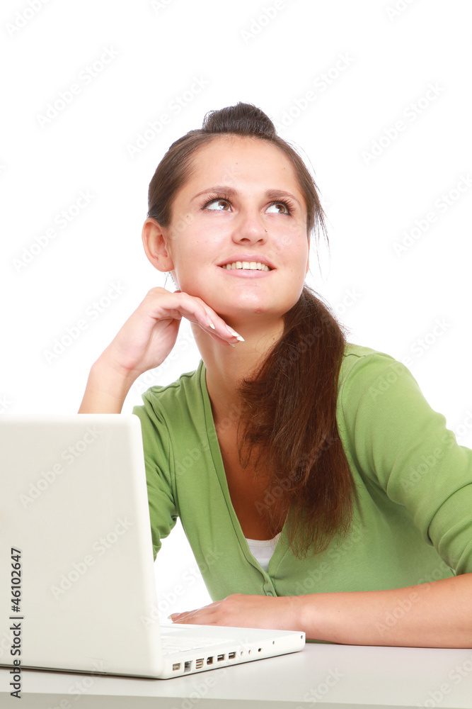 A looking up woman working at the desk A looking up woman working at the desk