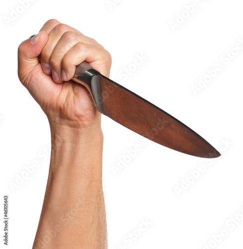 Hand with knife photo