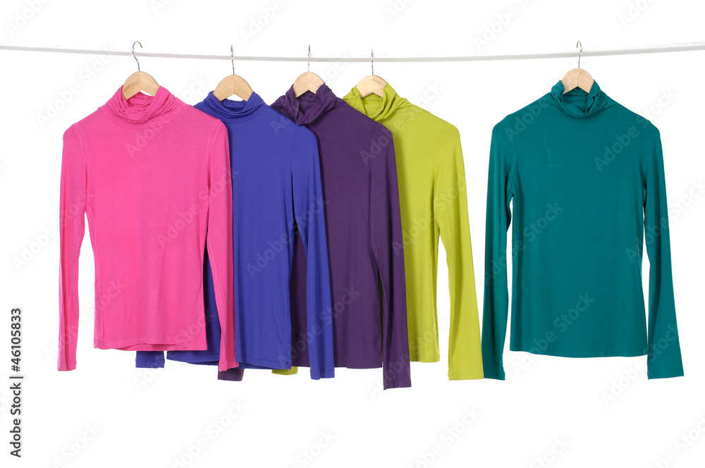 colorful clothing on hanger in a row colorful clothing on hanger in a row