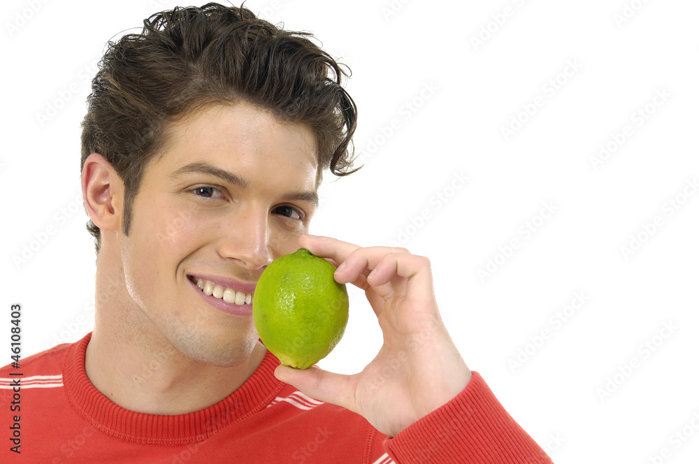 young man holding green lime,isolated young man holding green lime,isolated
