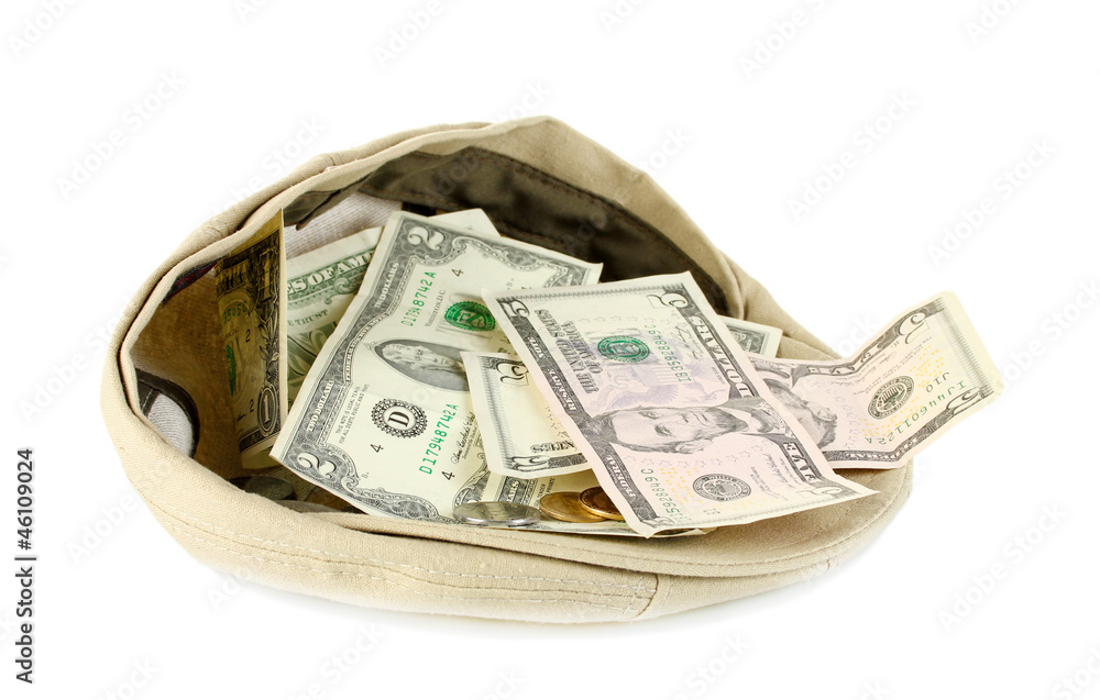 cap with money on a white background cap with money on a white background