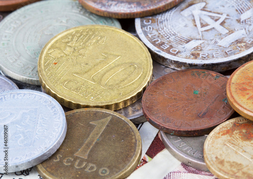 Old and new European coins. Close up