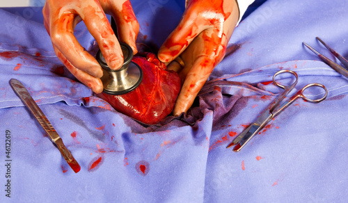 Doctor listening to a heart photo