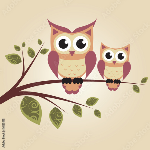 Two owls on the tree