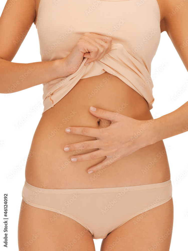 woman body in beige cotton undrewear