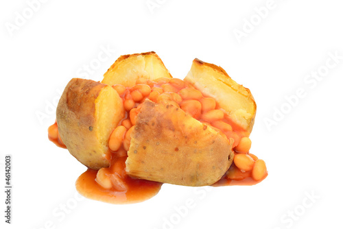 Jacket potato with baked beans isolated on white