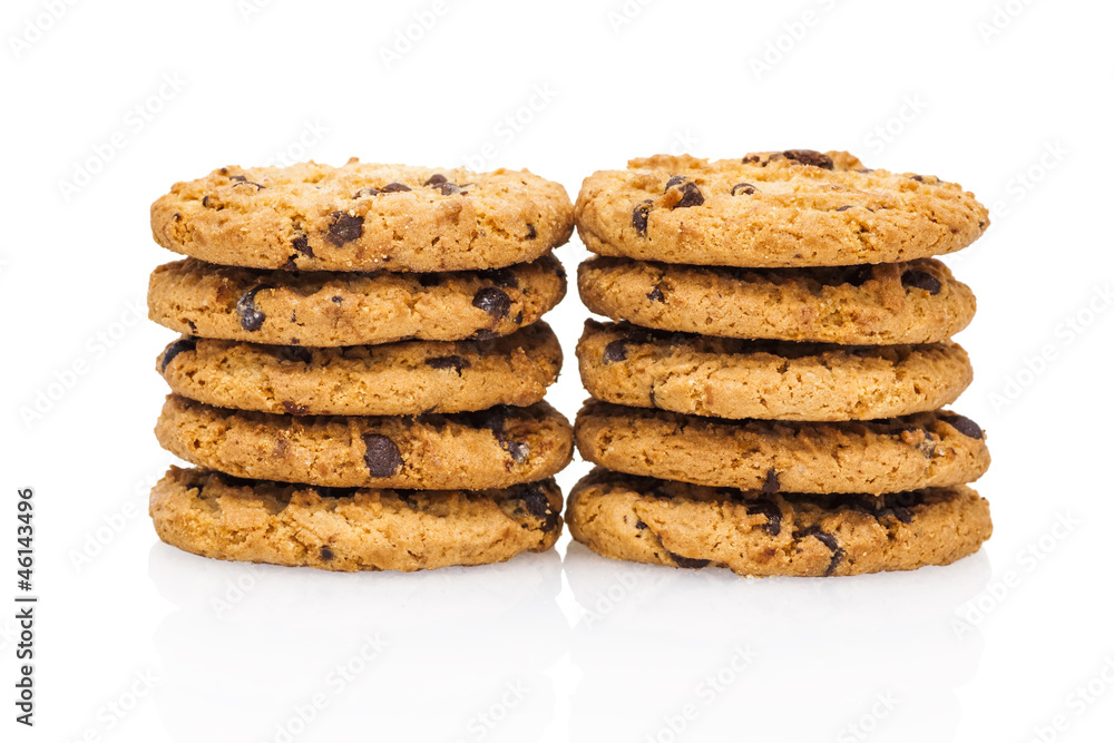 A stacks of chocolate chip cookies isolated on a white backgroun A stacks of chocolate chip cookies isolated on a white backgroun