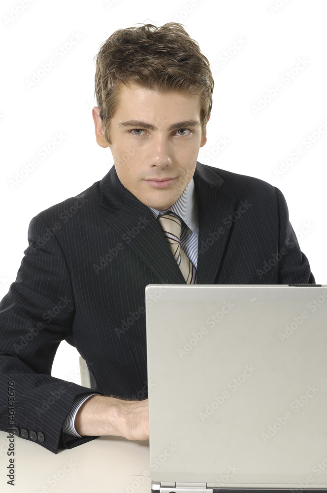 portrait of a successful h businessman working on computer portrait of a successful h businessman working on computer