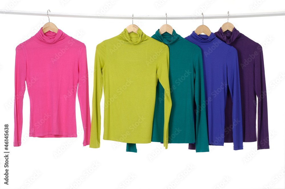 colorful clothing on hanger in a row colorful clothing on hanger in a row