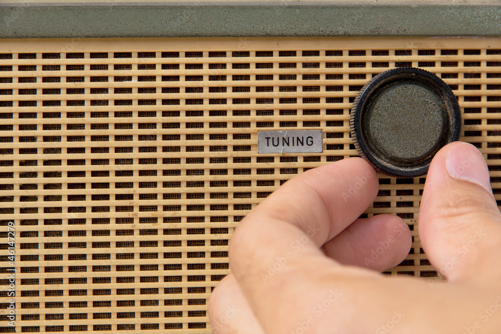 hand adjust vintage radio tuning knob concept Stock Photo | Adobe Stock