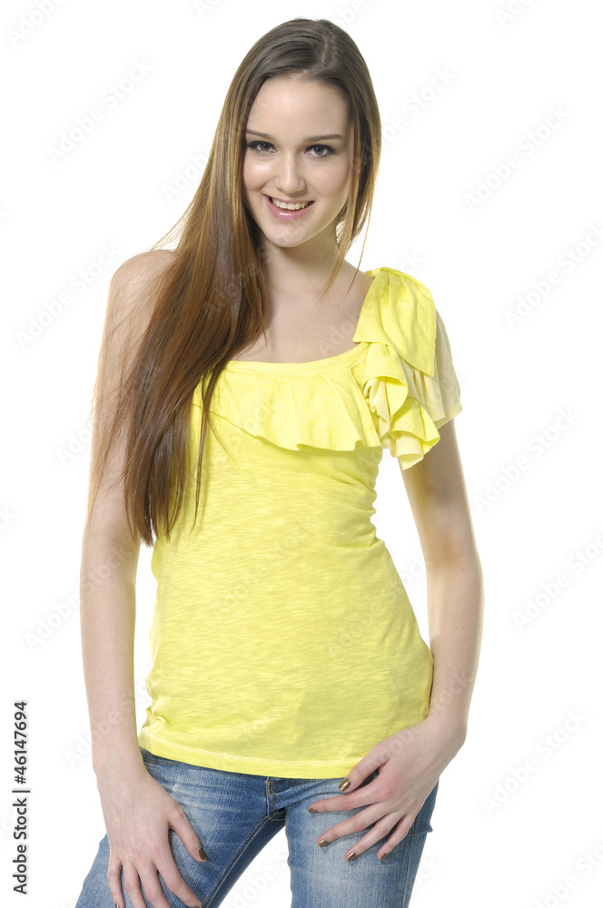 casual young woman in blue jeans smiling posing casual young woman in blue jeans smiling posing