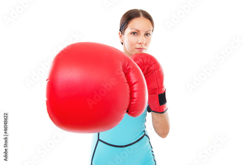 Pretty girl in boxing gloves pose, FOCUS ON FACE