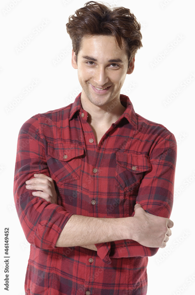 portrait of a stylish young man standing on white background portrait of a stylish young man standing on white background