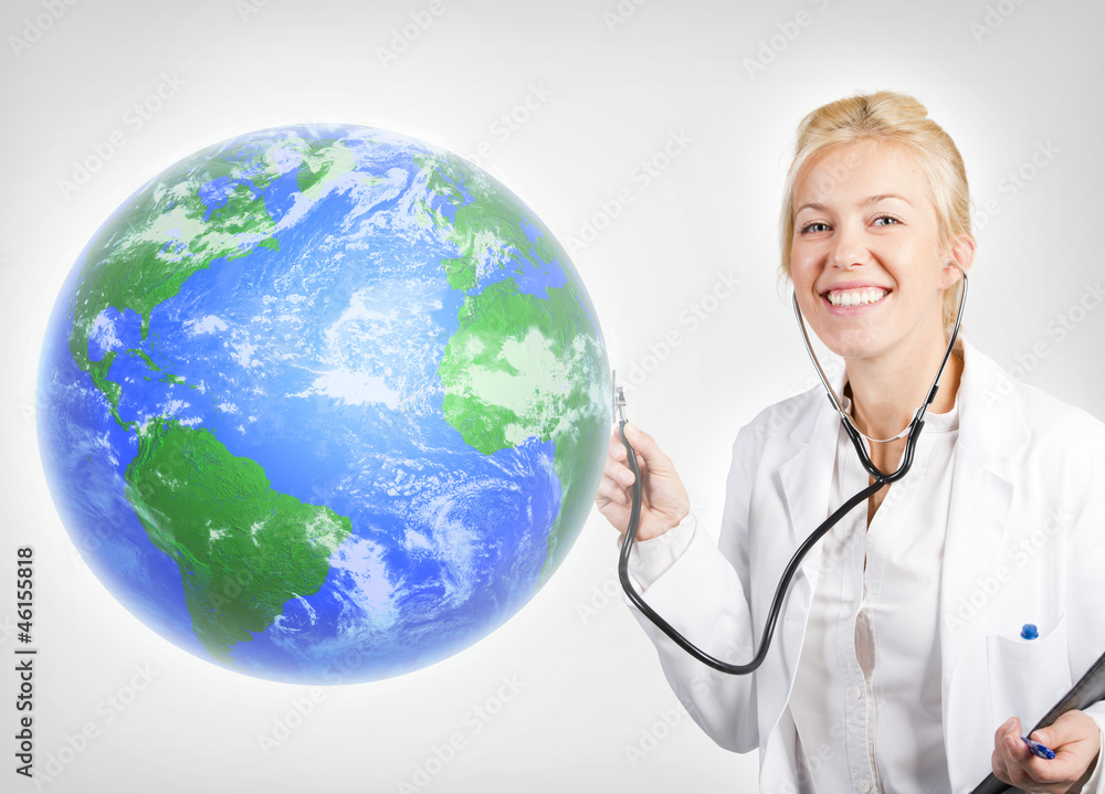 Attractive woman doctor examining planet Earth Attractive woman doctor examining planet Earth