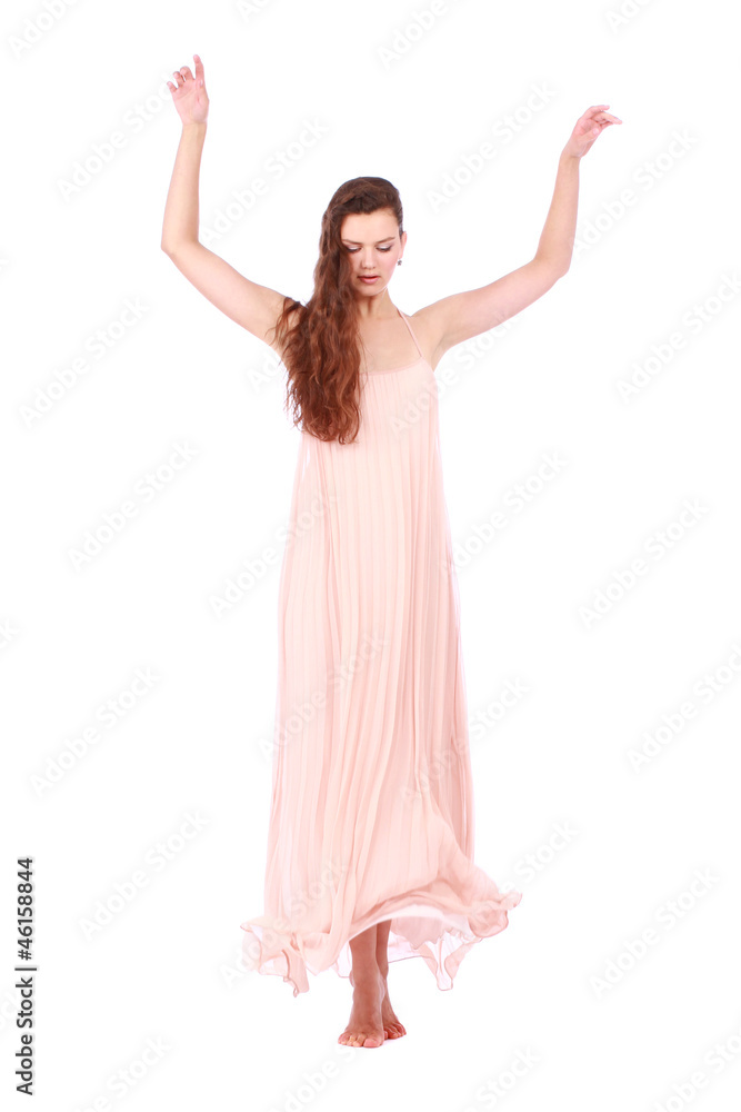 graceful girl in flying light pink dress, isolated on a white graceful girl in flying light pink dress, isolated on a white