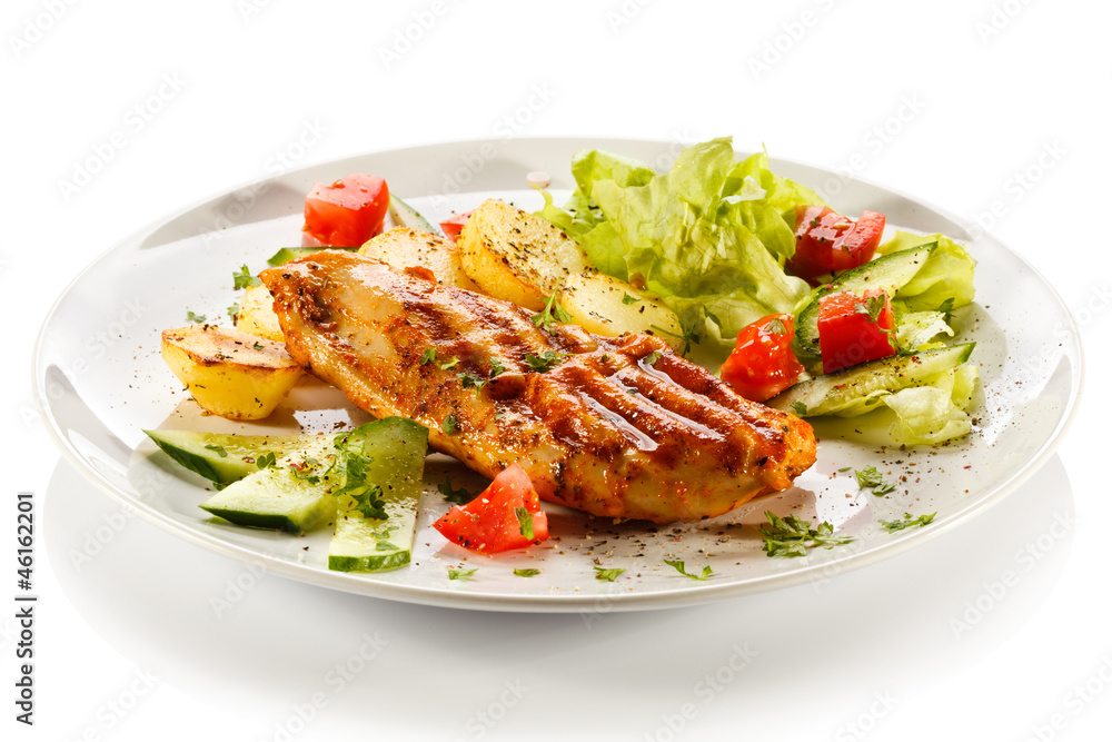 Grilled steaks, baked potatoes and vegetables Grilled steaks, baked potatoes and vegetables