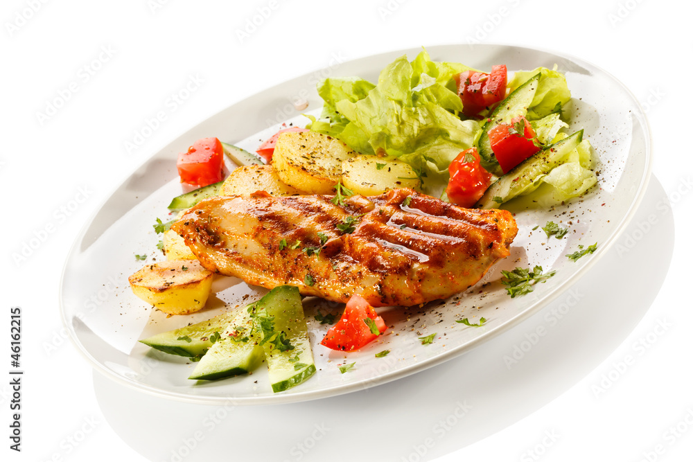 Grilled steaks, baked potatoes and vegetables Grilled steaks, baked potatoes and vegetables