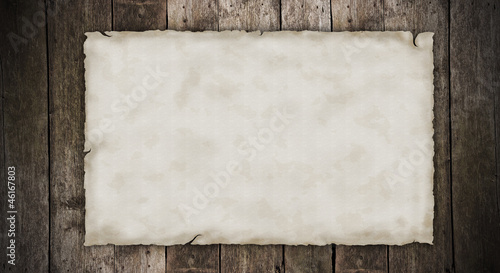 Blank old paper on wooden planks