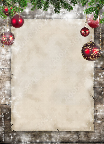 Christmas theme with blank paper on wooden planks