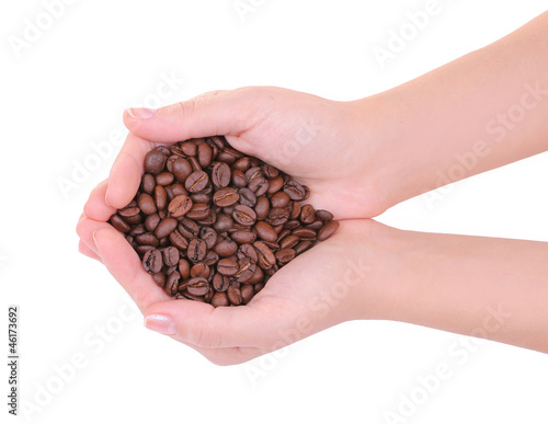 coffee beans in hands isolated on white