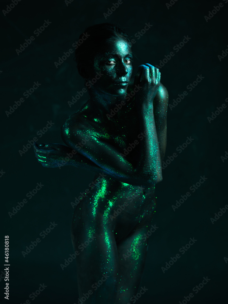 artistic nude of woman shiny blue skin artistic nude of woman shiny blue skin