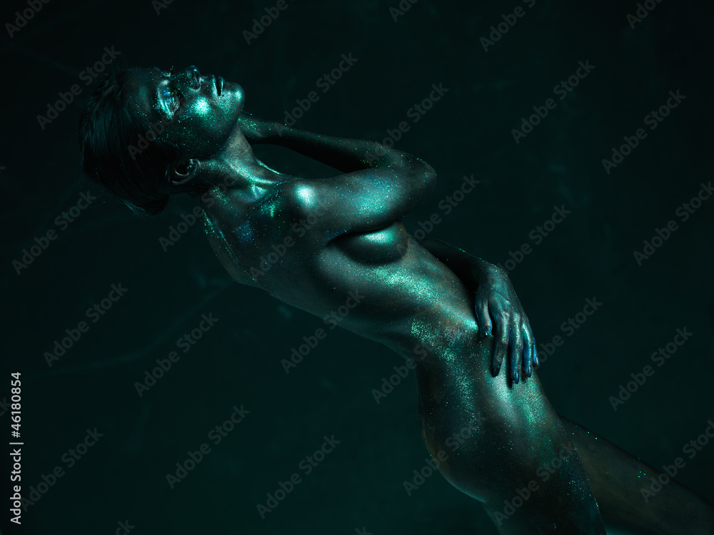 Fototapeta premium artistic nude of woman shiny blue skin