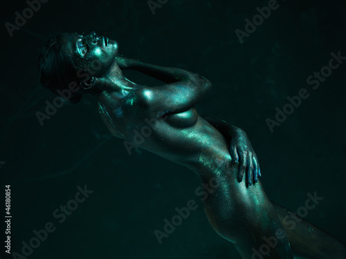 artistic nude of woman shiny blue skin © Daco