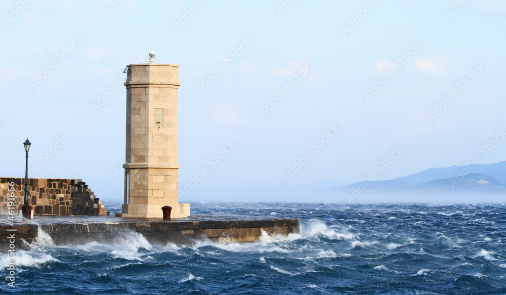 Picture represents the lighthouse while blowing strong wind