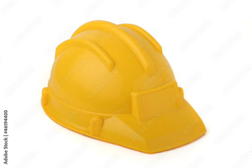 Fototapeta premium Yellow protective helmet isolated on white