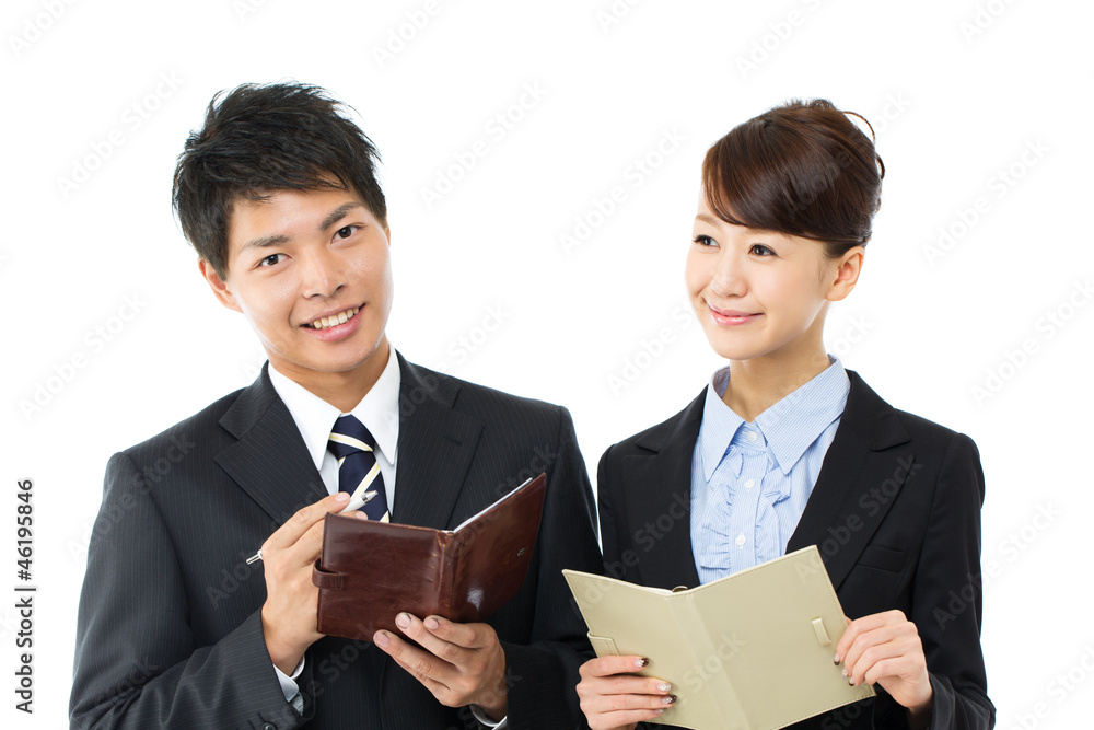 Young asian smiling business woman and businessman Young asian smiling business woman and businessman