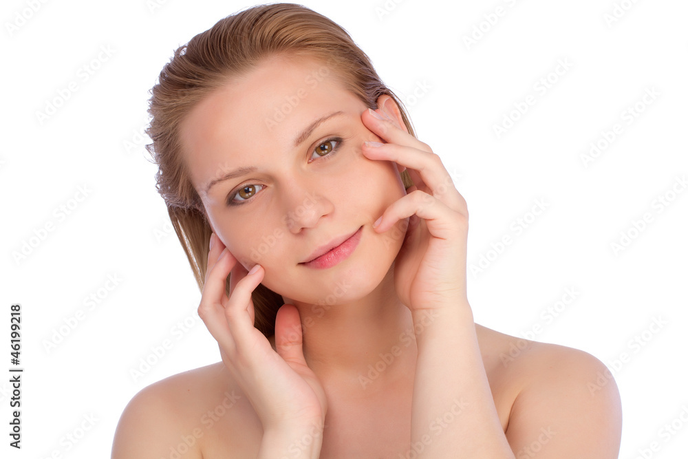 Bright shot of young attractive nude girl touching her face Bright shot of young attractive nude girl touching her face