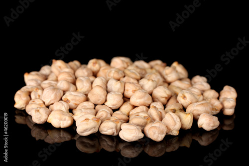 White chickpeas isolated on black