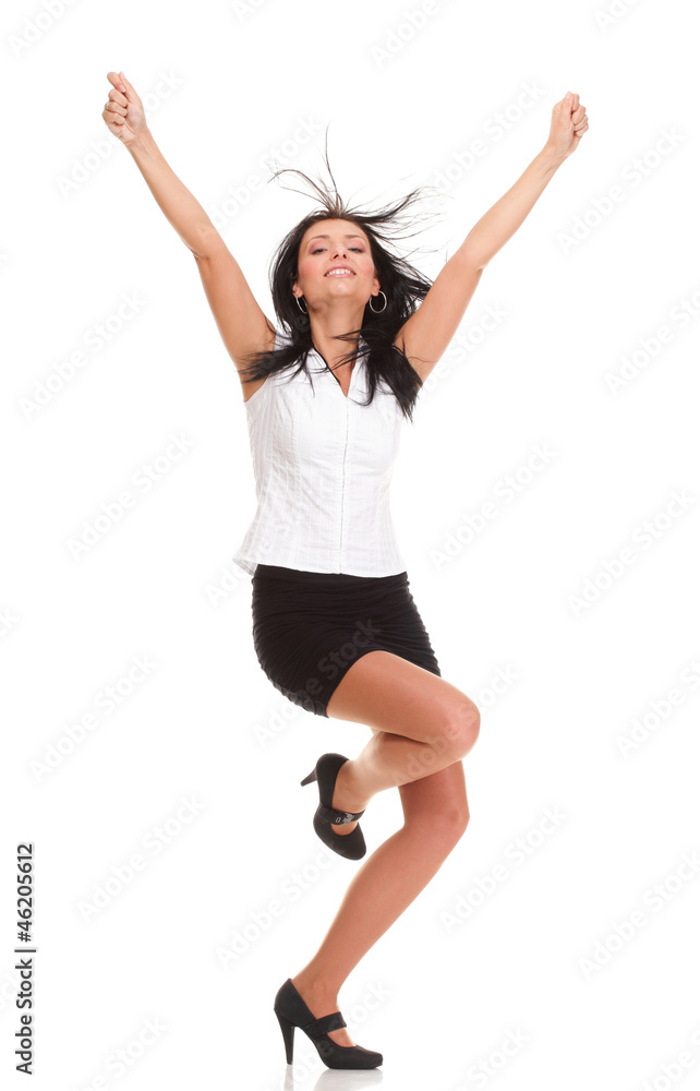 Woman clenching arms in excitement