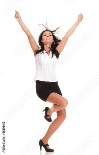 Woman clenching arms in excitement