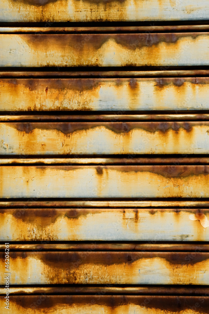 Old rusty metal slat door Old rusty metal slat door