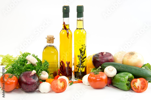 Fototapeta Naklejka Na Ścianę i Meble -  Olive oil with onion, tomato, garlic and peppers