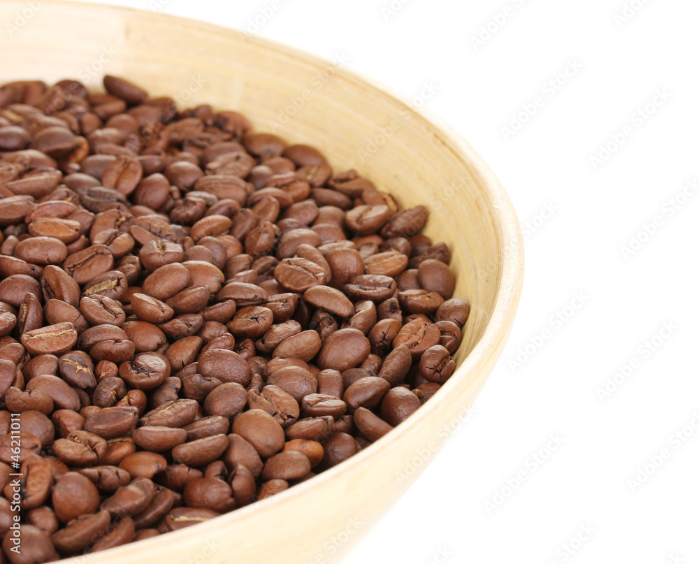 Coffee beans in bamboo bowl isolated on white Coffee beans in bamboo bowl isolated on white