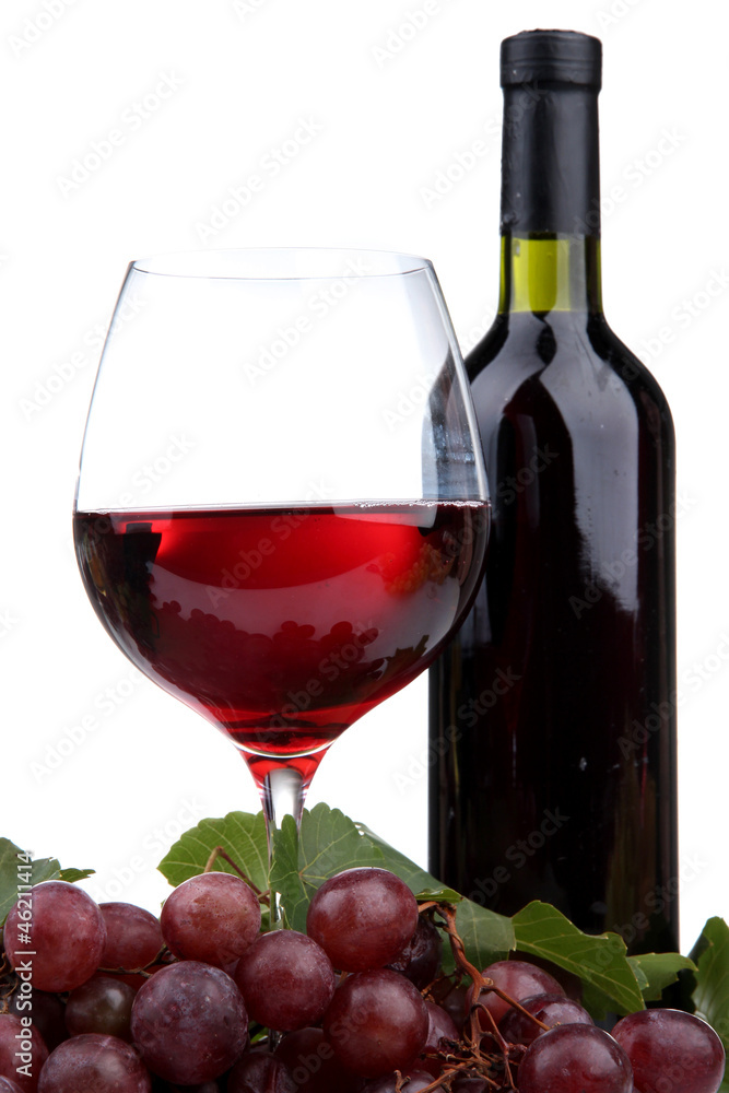 bottle and glass of wine and grapes, isolated on white