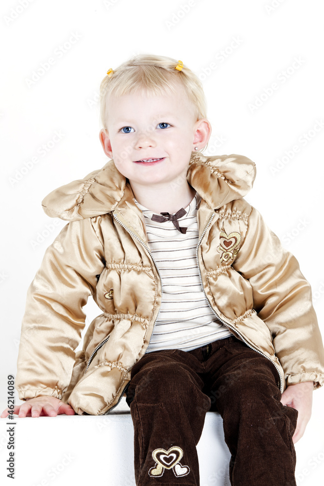 portrait of sitting little girl wearing jacket portrait of sitting little girl wearing jacket