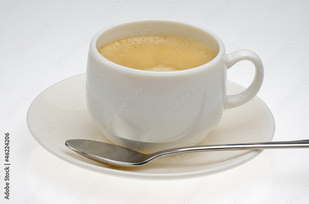 coffe with spoon on plate