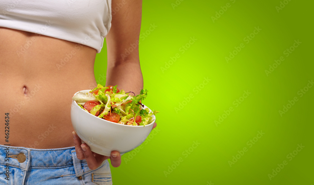 Female Holding A Bowl Of Salad Female Holding A Bowl Of Salad