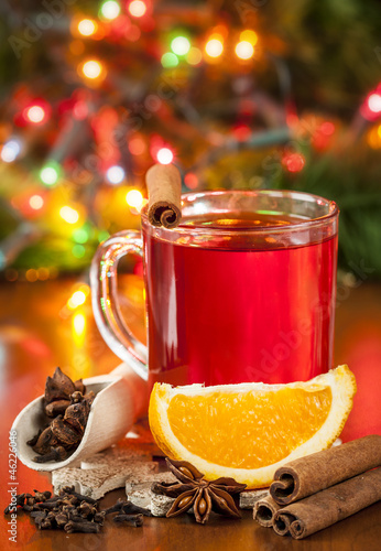 Hot winter drink with spices and orange.