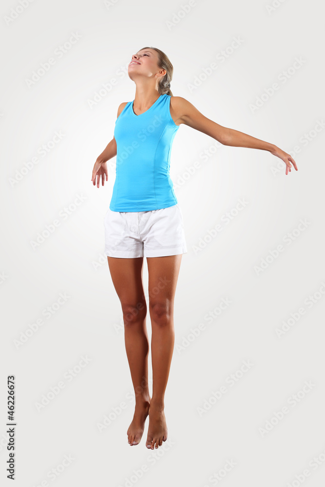 Fototapeta premium fitness woman jumping excited