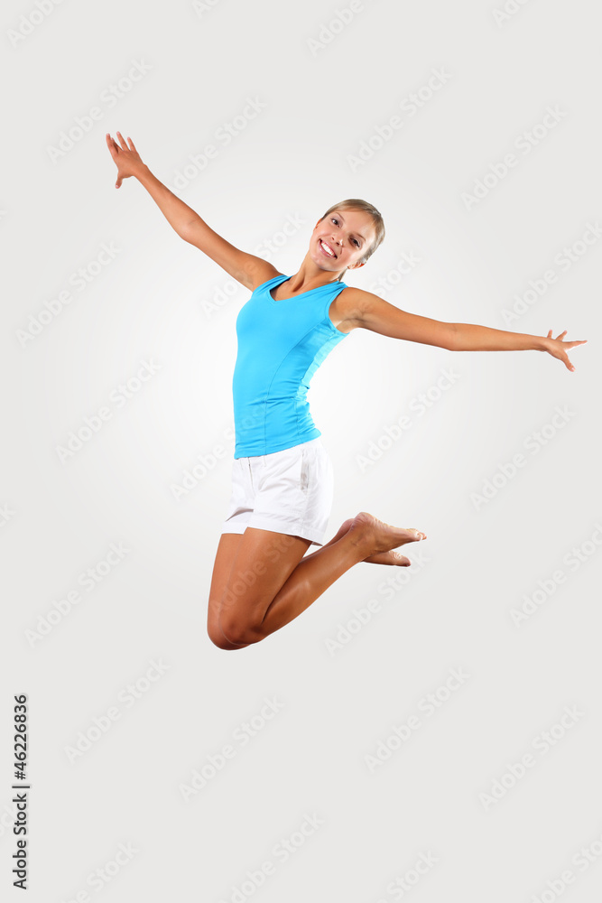 fitness woman jumping excited