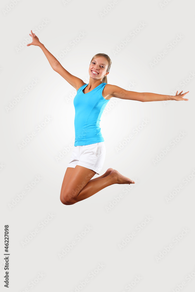 fitness woman jumping excited