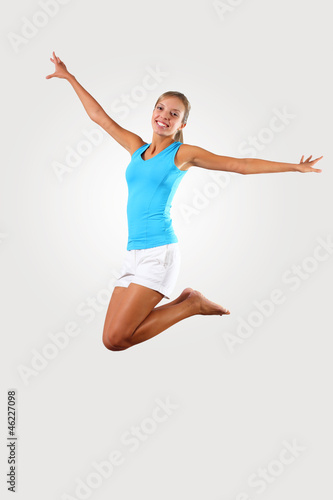 fitness woman jumping excited