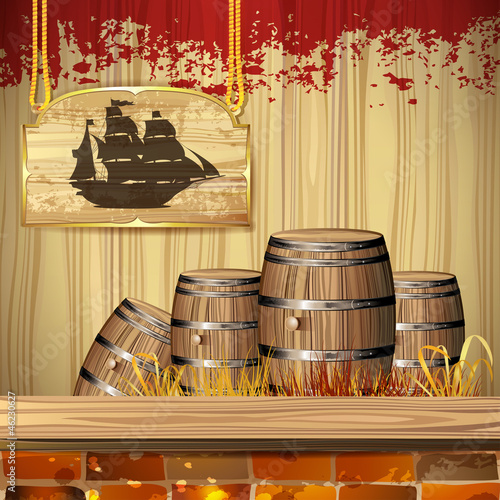 Pirate ship over wood banner and barrels
