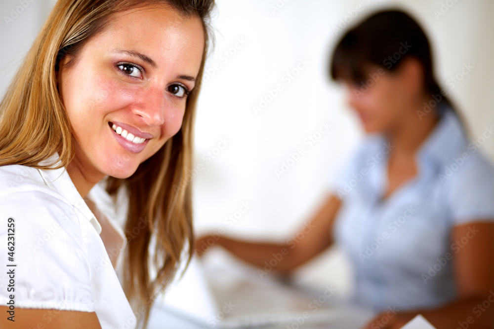 Caucasian blonde female smiling and looking at you Caucasian blonde female smiling and looking at you
