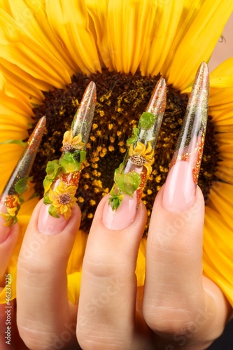 Stiletto nails with sunflowers photo