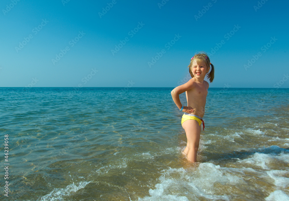 ittle girl on the beach